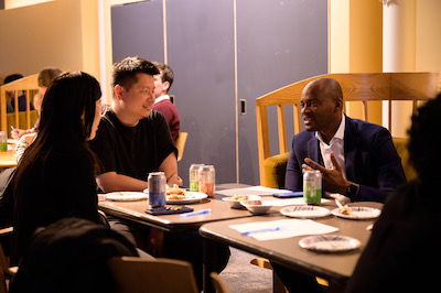 woman and man at table laughing