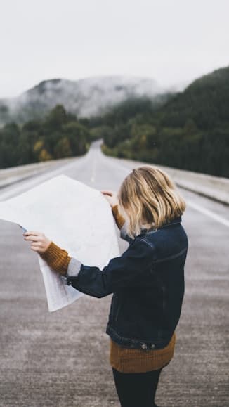 woman looking at a map
