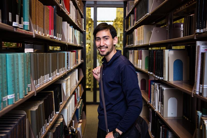 man in library