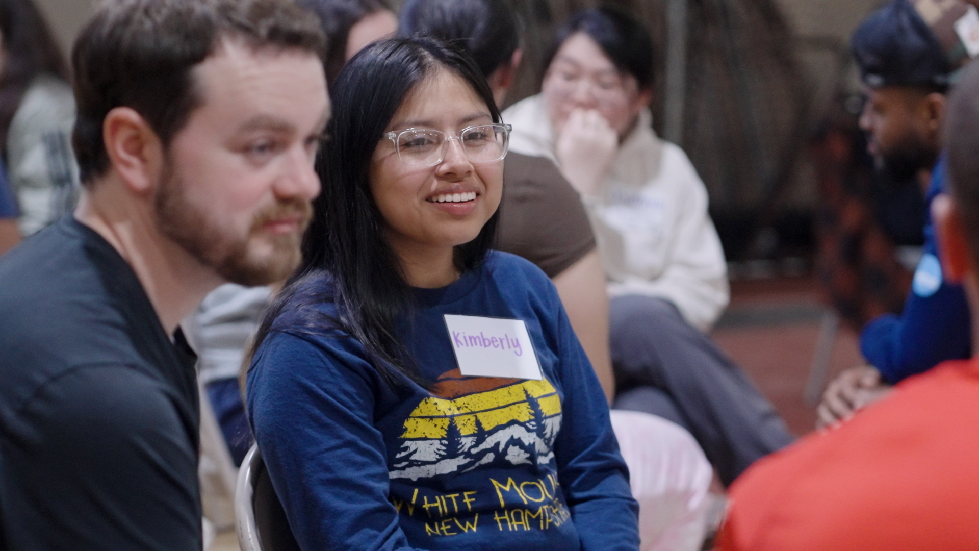 two people engage in community bible study