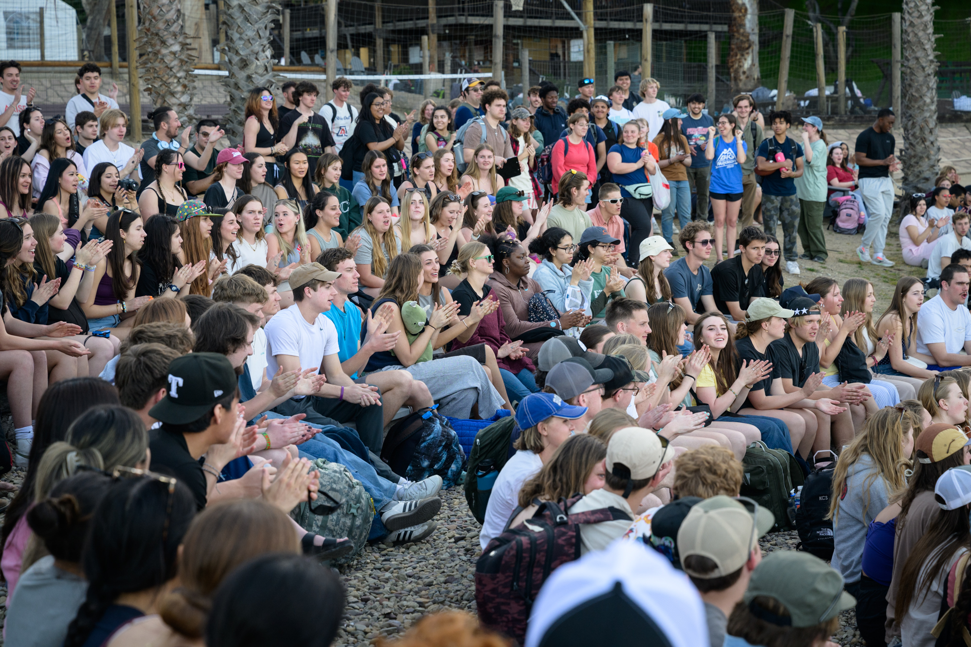 100s of students gather at the amphitheater for orientation