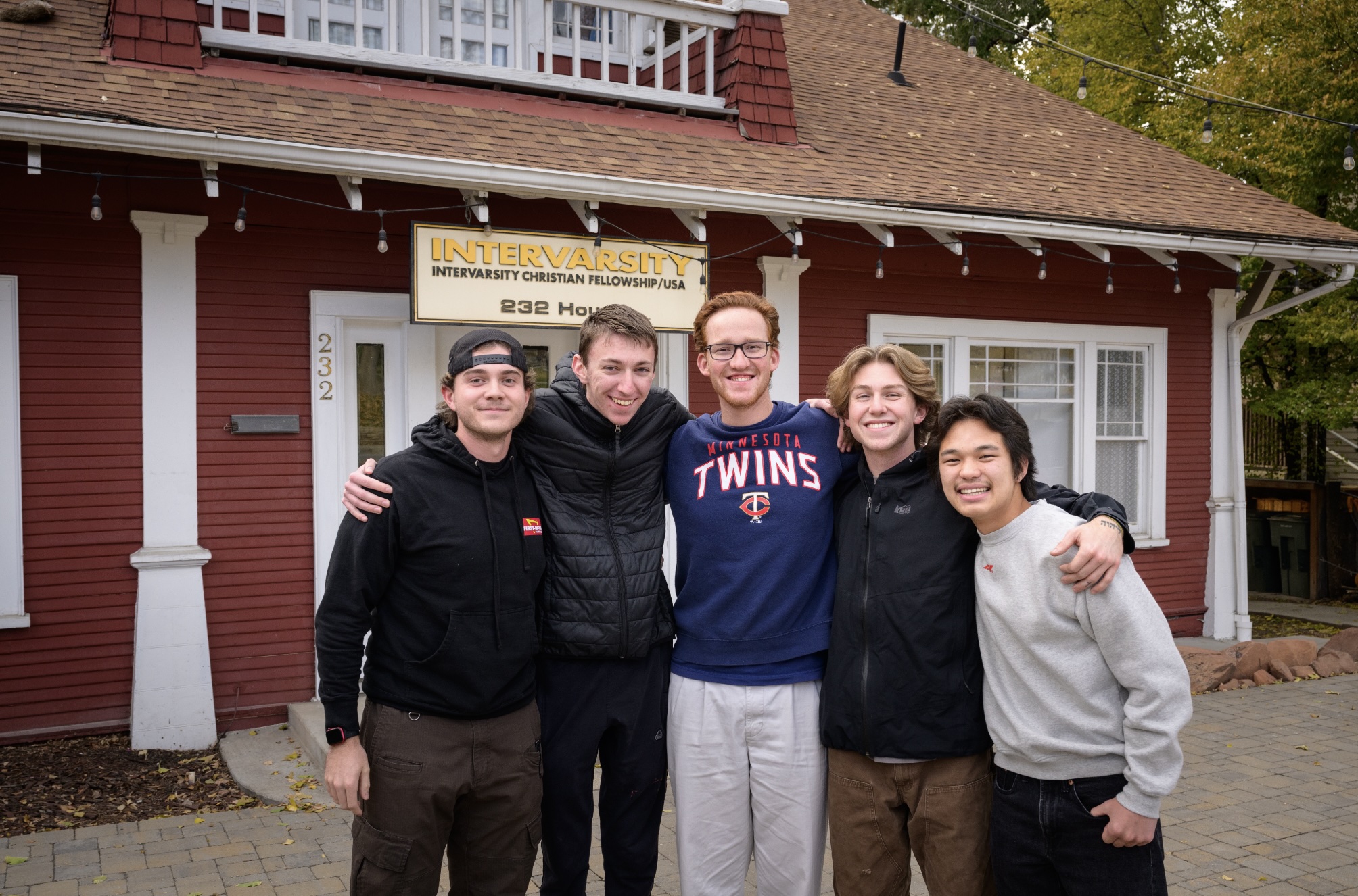 Sean with friends posing for a group photo