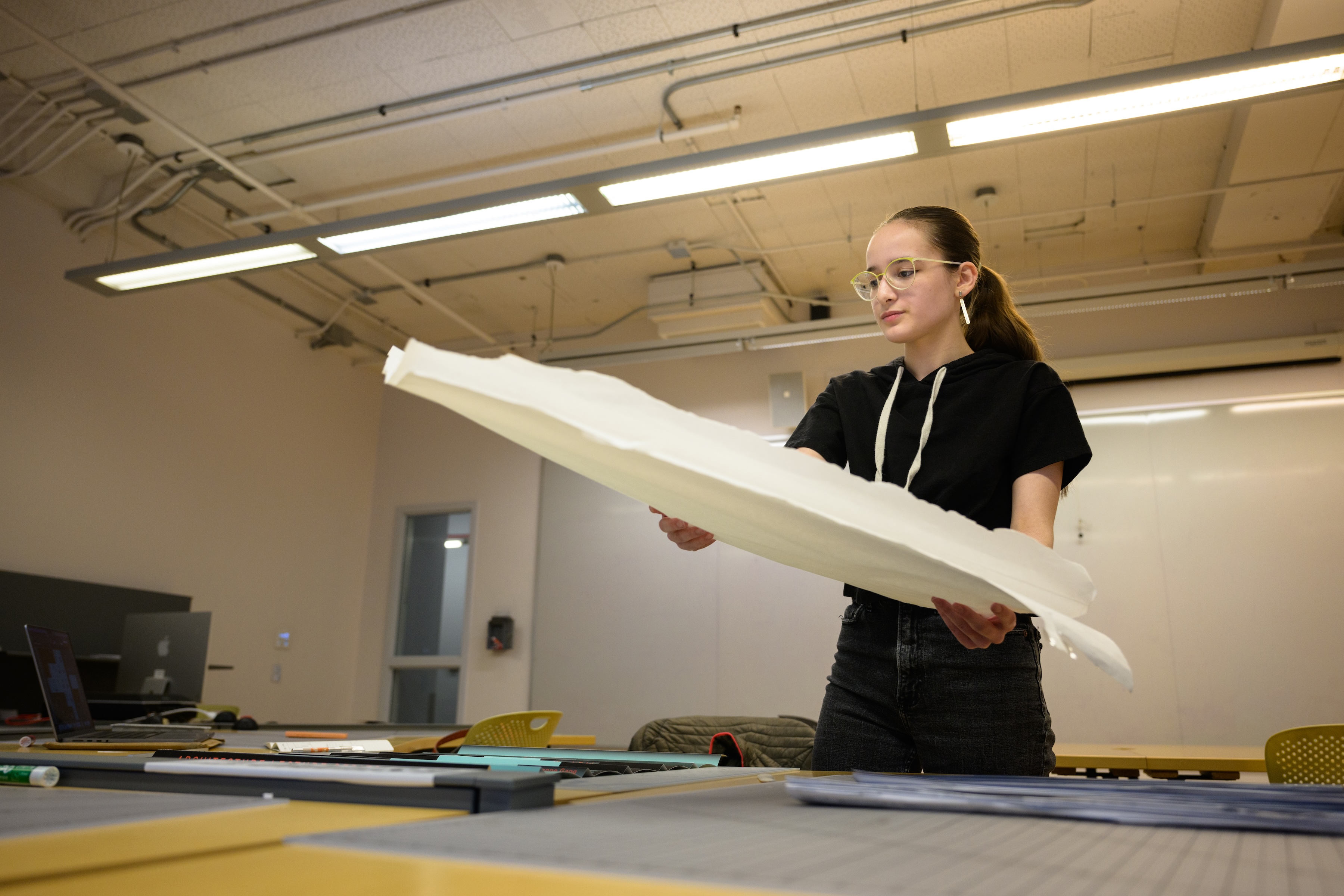 Magdalena sets up an art project