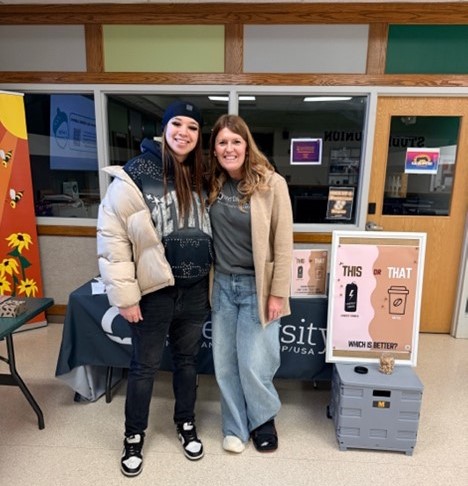 two women smiling for photo