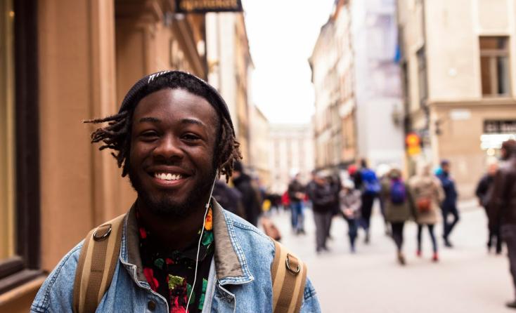 black student with headphones