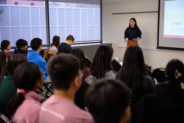 Student leader giving presentation to group