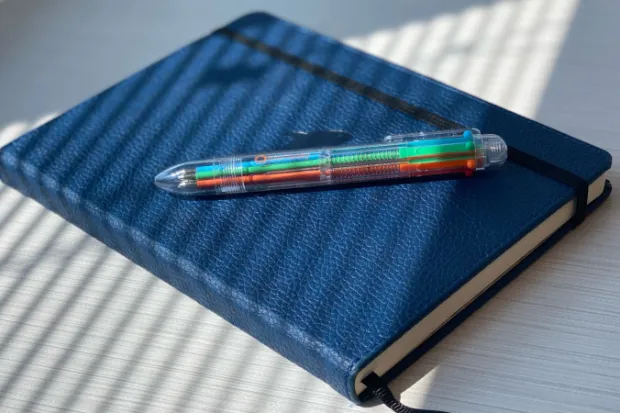 Colored Pen and Blue Journal