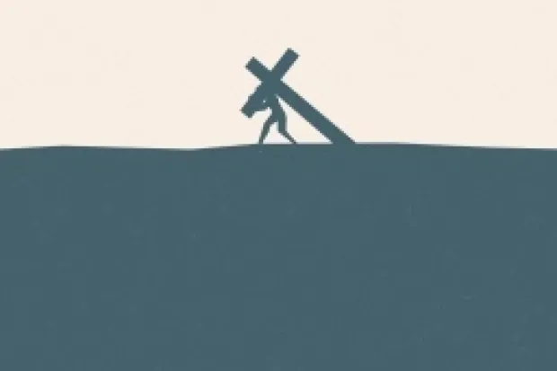 silhouette of Jesus carrying cross