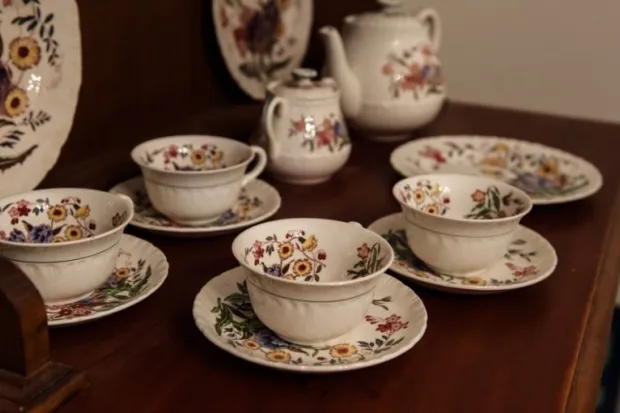 a set of fine china sitting on a table