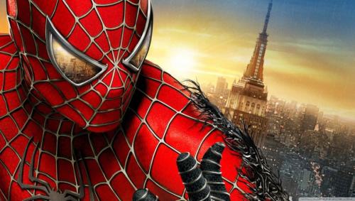 Spider-Man close-up with cityscape in background