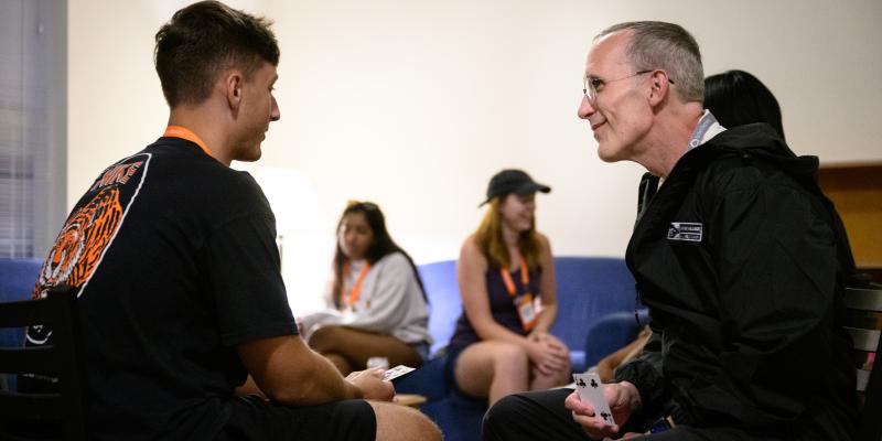 Jason and student talking