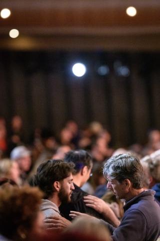 elijah receiving prayer at a conference 