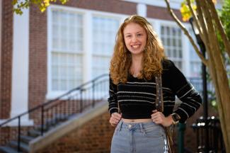 Female student standing on campus