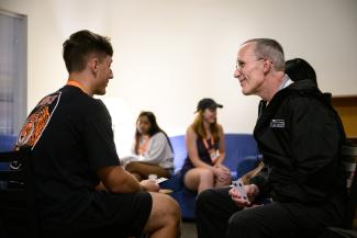 Jason and student talking