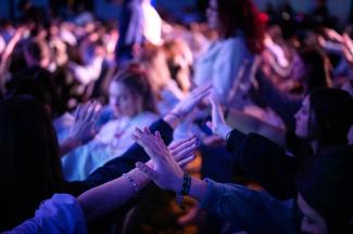 hands raised in worship and prayer