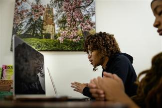 two female students praying