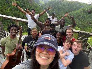 students smiling for photo outside