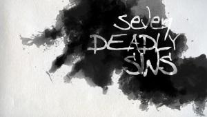 Black ink spot against a white background with "Seven Deadly Sins" written on it