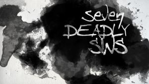 Ink splotches with "Seven Deadly Sins" written out in messy white letters