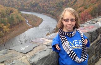 Kat Roffina portrait overlooking river scene