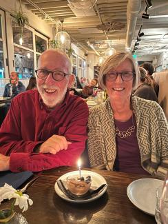 Man (Len) and his wife (Mary) sit next to each other