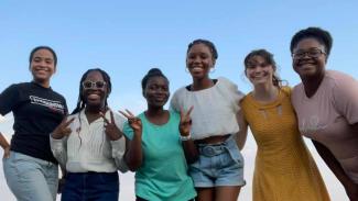 Group photo of students from BCM chapter outside on beach