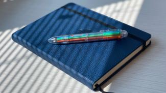 Colored Pen and Blue Journal