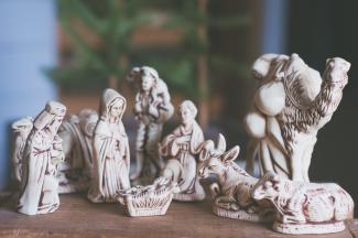 Ornate nativity set with Mary, Joseph, Jesus, Wise Men, and stable animals