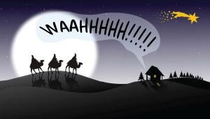 Nativity scene with three silhouetted figures on camels with moon in the backdrop and shining star. The word "Waahhhh!!!" is written directly above a small stable.