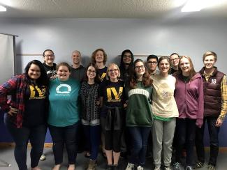 a group of students smiling at the camera