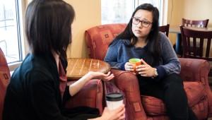 two women having a serious conversation