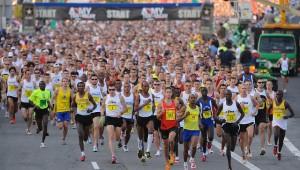 Large crowd of people running marathon