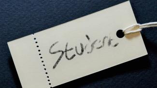 Label with the word "Student" partially erased