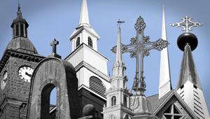 a skyline with a variety of steeples and cross-topped roofs