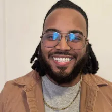 Tim smiling