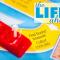 A plastic red car on the board from the board game "Life", and the words "The Life Ahead"