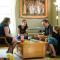 a family gathered around a coffee table