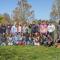 Group photo of students standing outside on lawn