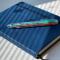 Colored Pen and Blue Journal