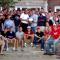 Group photo of male college students outside fraternity house