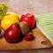 Fruit resting on a wooden table representing the fruit of the Spirit.