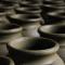 Closeup of a group of grey clay jars