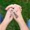 Person's hands folded for prayer with the words: "I Fail at Prayer" written on hands in marker.