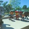 Avengers action figures clustered around large giant Thanos character