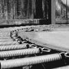 black and white image of the metal springs of a trampoline