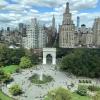 an aerial picture of the New York City skyline and NYU's campus