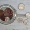 Glass jar full of pocket change