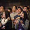 Group of people worshiping at church