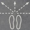 Chalk outline of footsteps with five arrows pointing outward in all directions
