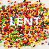 Pile of multicolored jelly beans with the word "Lent" spelled out in the middle of them